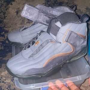 Gray and Black High-Top Sneakers with Gold Accent